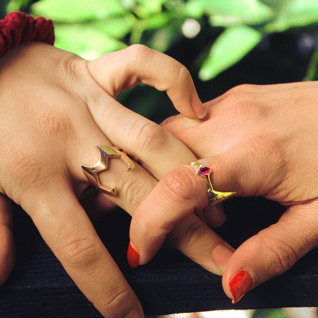 She-ra crown Ring from She-Ra and the princesses of power on hand, with Catra Helmet ring 