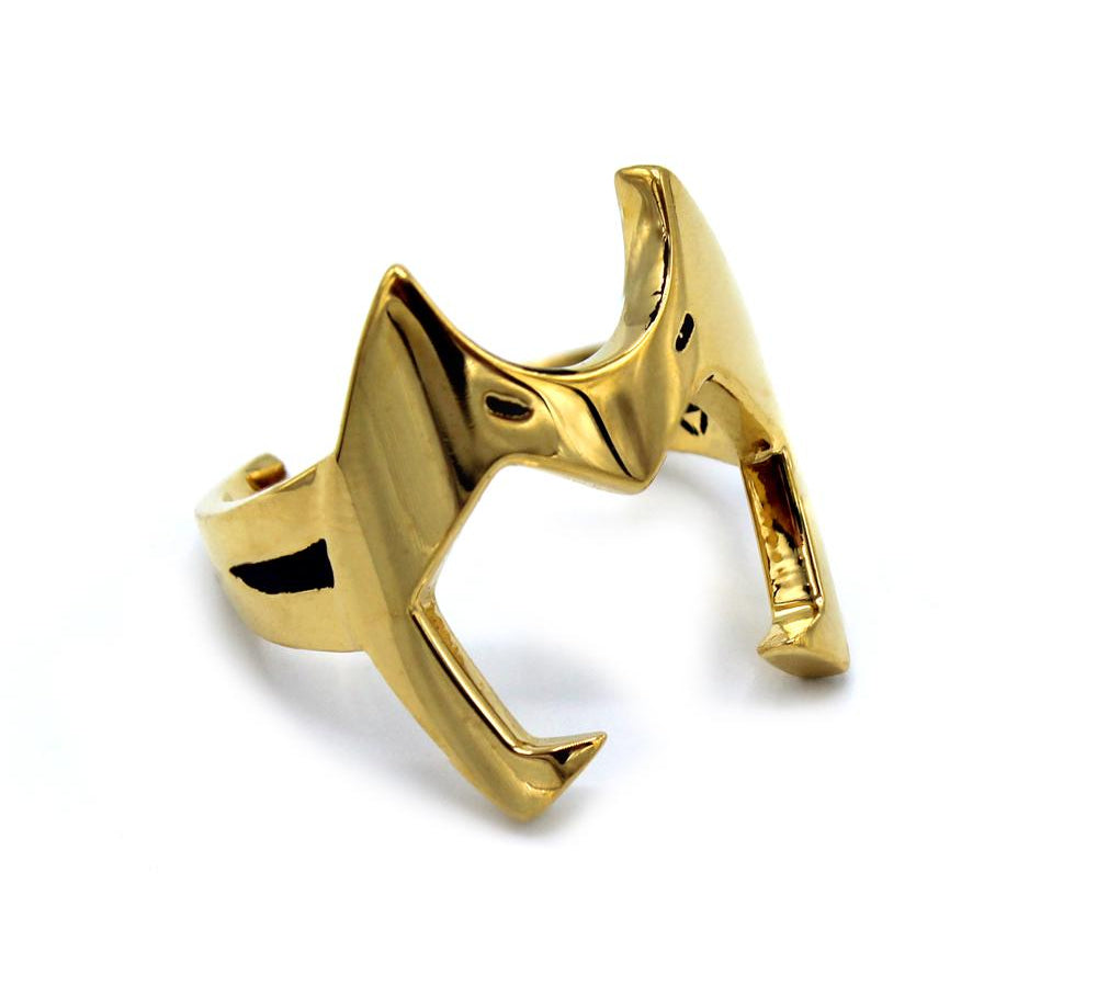3/4 side of the Catra helmet ring in gold from the she-ra and the princesses of power collection