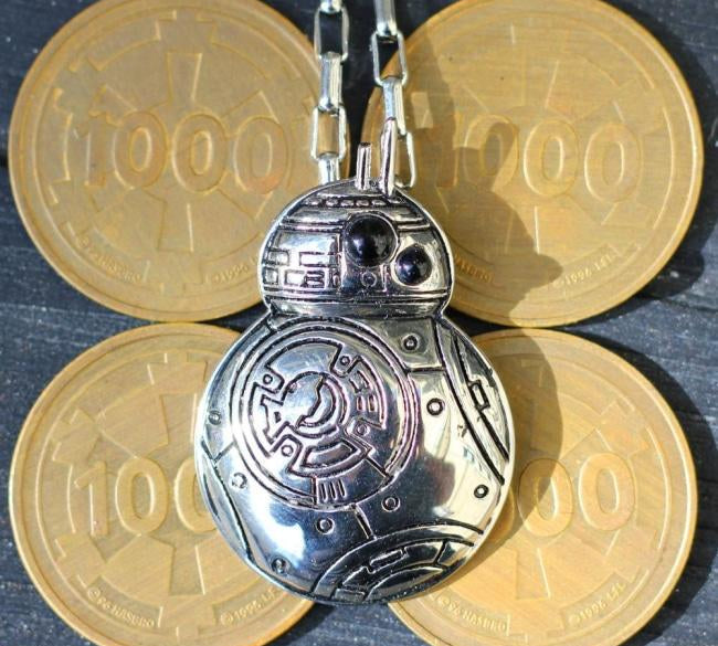 shot of the bb8 pendant on imperial coins from the star wars monopoly game