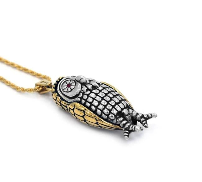 right side of the Big Bobo Owl Pendant in 2 silver and gold from the han cholo fantasy collection