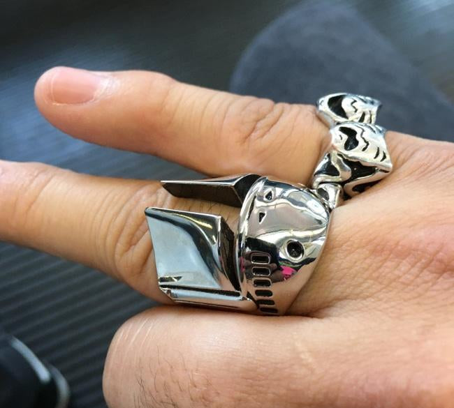 shot of the boba fett ring and the smile now cry later on a mand hand