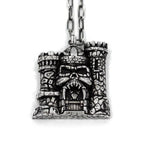 front of the castle grayskull pendant in silver from the masters of the universe collection