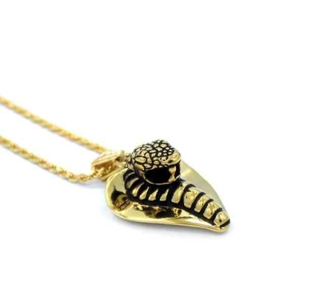 left angle of the Cobra Lover Pendant in gold from the fantasy collection