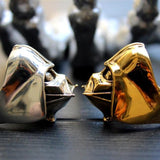 shot of the darth vader ring in gold and silver side by side
