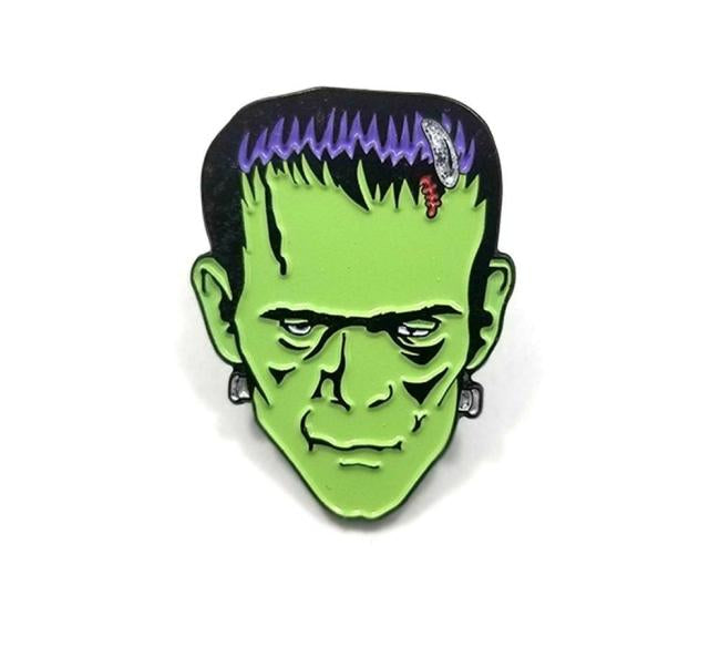 front of the Frankenstein Enamel Pin from the universal monsters jewelry collection