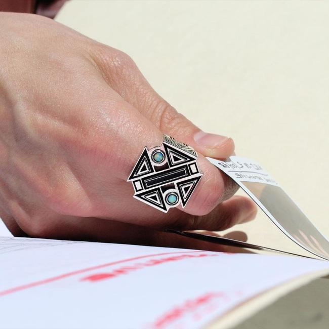 shot of a man reading wearing the future primitive ring