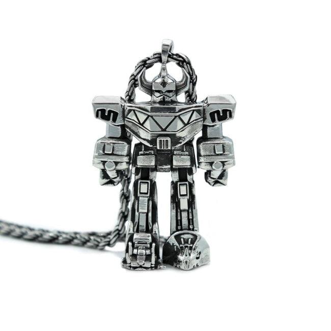 front view of the megazord pendant from the mighty morphin power rangers on a white background
