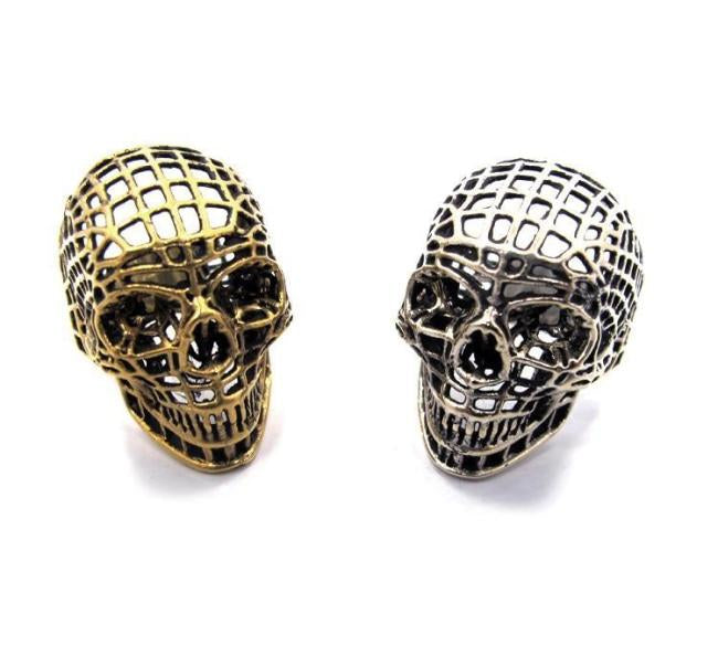 shot of the mesh skull ring in silver and gold from the han cholo skulls collection