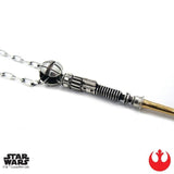 close up shot of the Obi-Wan Saber Pendant from the han cholo star wars collection