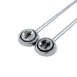 right side view of the Player 1 player 2 necklaces on a white background