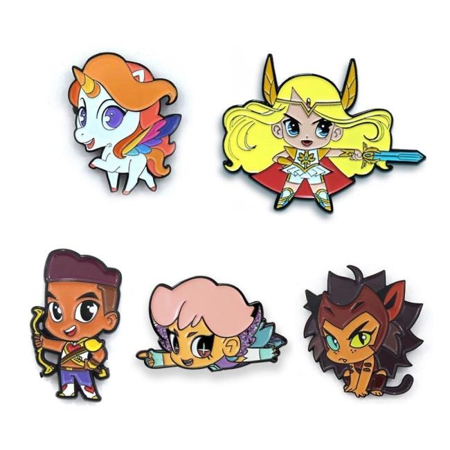 shot of all 5 she-ra chibi enamel pins casting a shadow on a white background