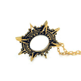angled view of the Stargate Pendant in gold from the han cholo jewelry collection