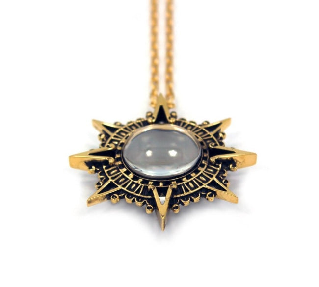 up close shot of the Stargate Pendant in gold from the han cholo jewelry collection