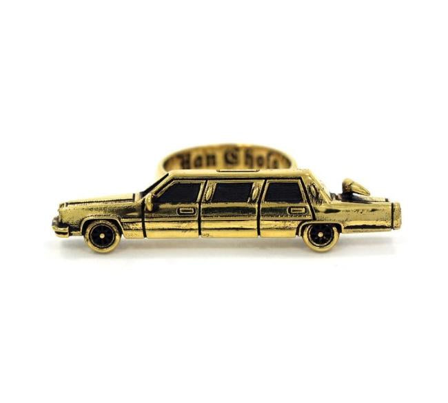 front of The High Life Ring in gold form the han cholo cruising collection