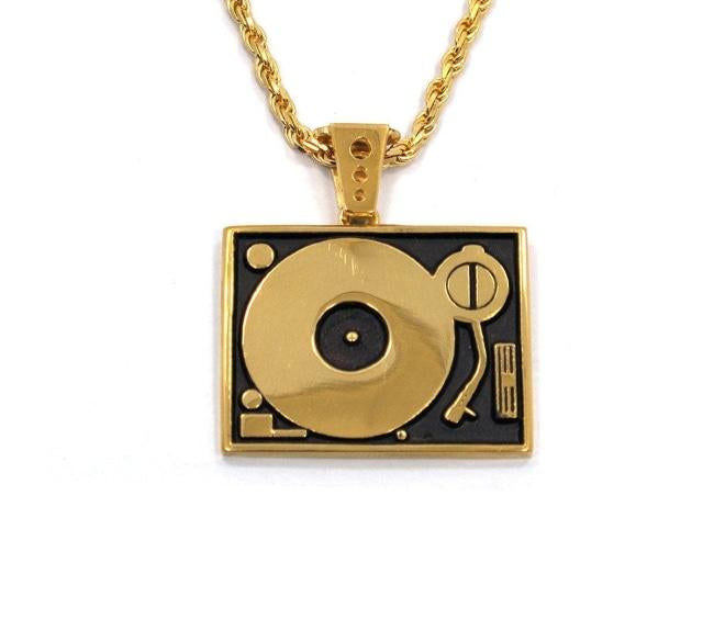 front of the Turntable Pendant in gold from the han cholo music collection