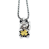 two tone unlucky cat necklace with cat having middle finger and holding gold clover