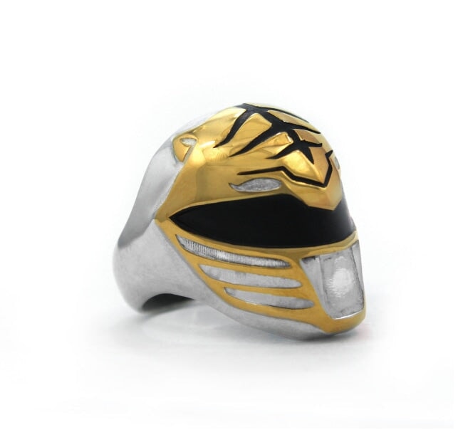 side view of the mighty morphin power rangers white ranger ring on a white background