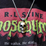 shot of the 2 tone skull pendant from the han cholo skulls collection on a goosebumps shirt