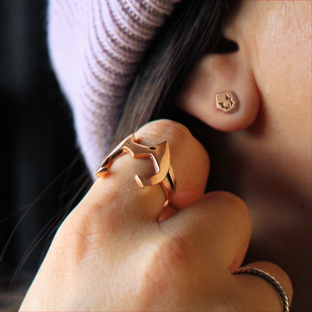 Horde stud earrings and catra helmet ring from she-ra and the princesses of power