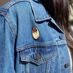 jurassic park dinosaur enamel pin on jean jacket, jurassic park pin