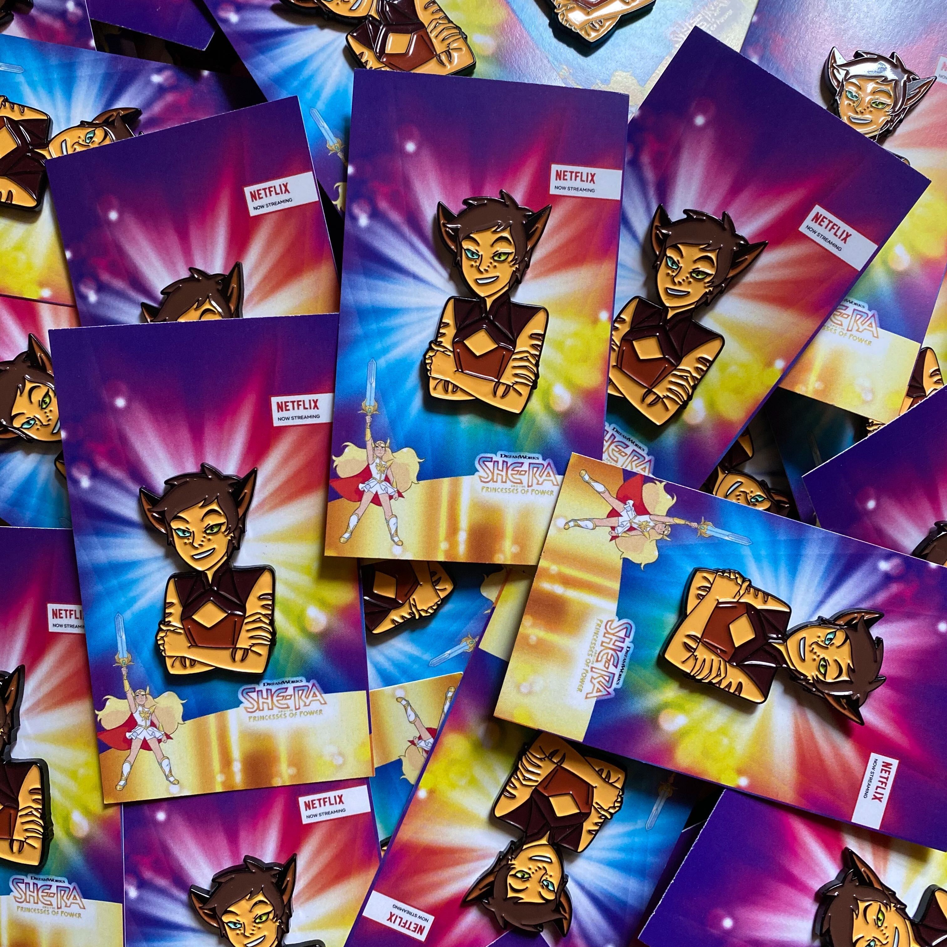 picture of multiple adorable catra pins on card stcked on top of eachother