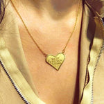 shot of the best friends squad pendant being worn on a woman with the pendant laying on her chest