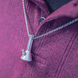 bong pendant on purple shirt