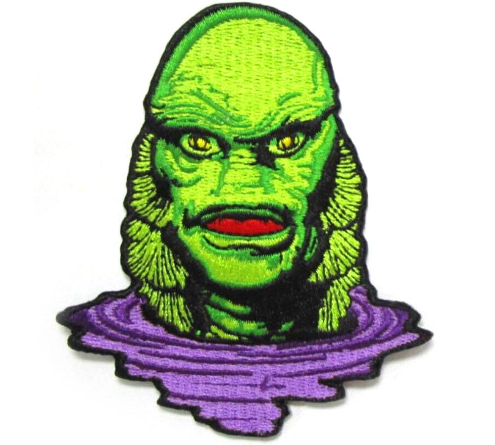 front of the Creature Lurking Patch from the universal monsters jewelry collection