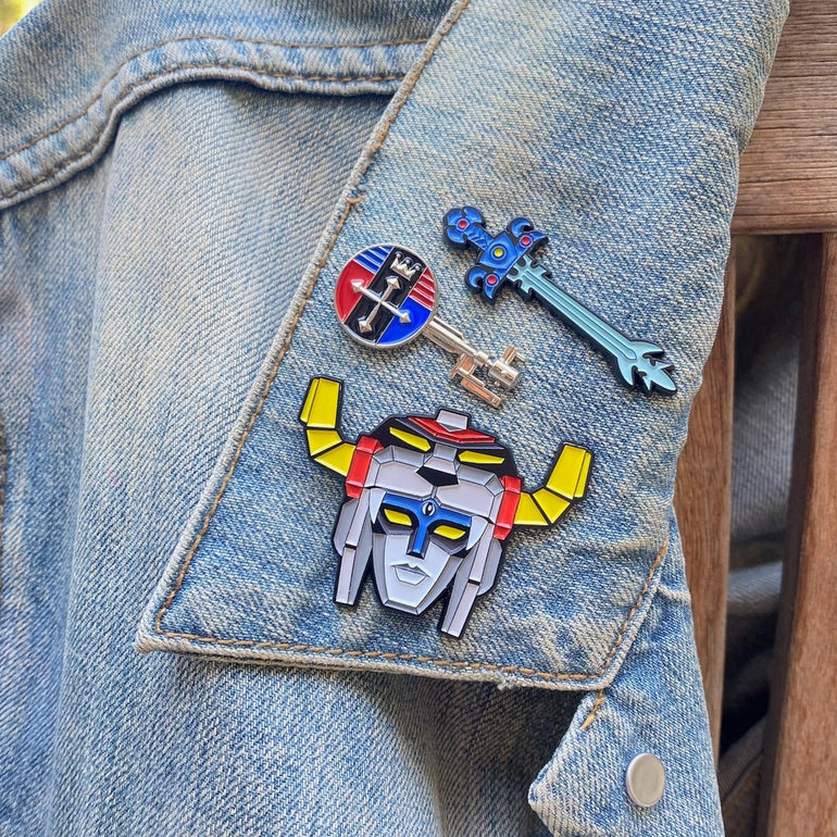 Voltron head enamel pin