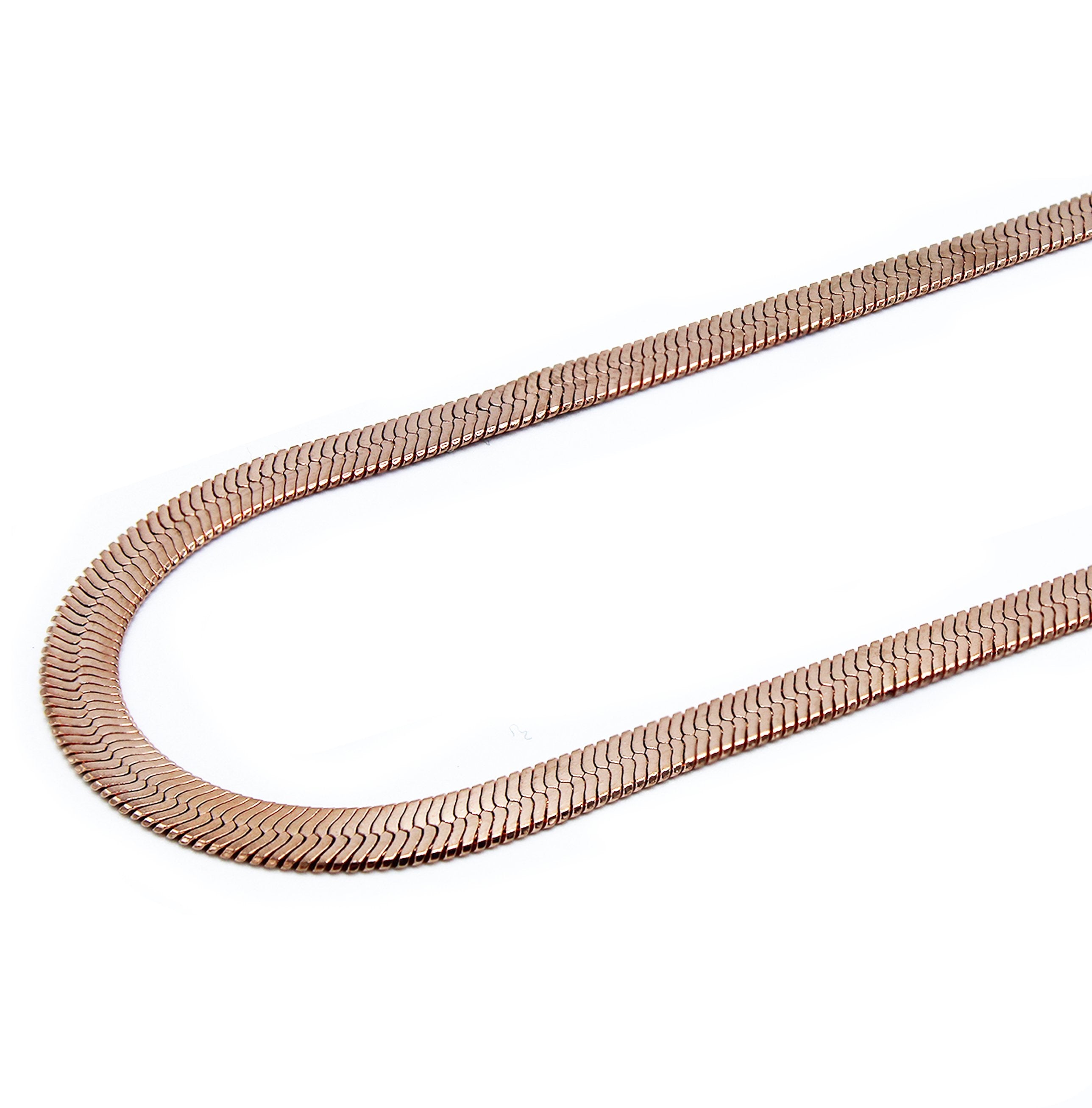 angled shot of the herring bone in rosegold laying on a white background
