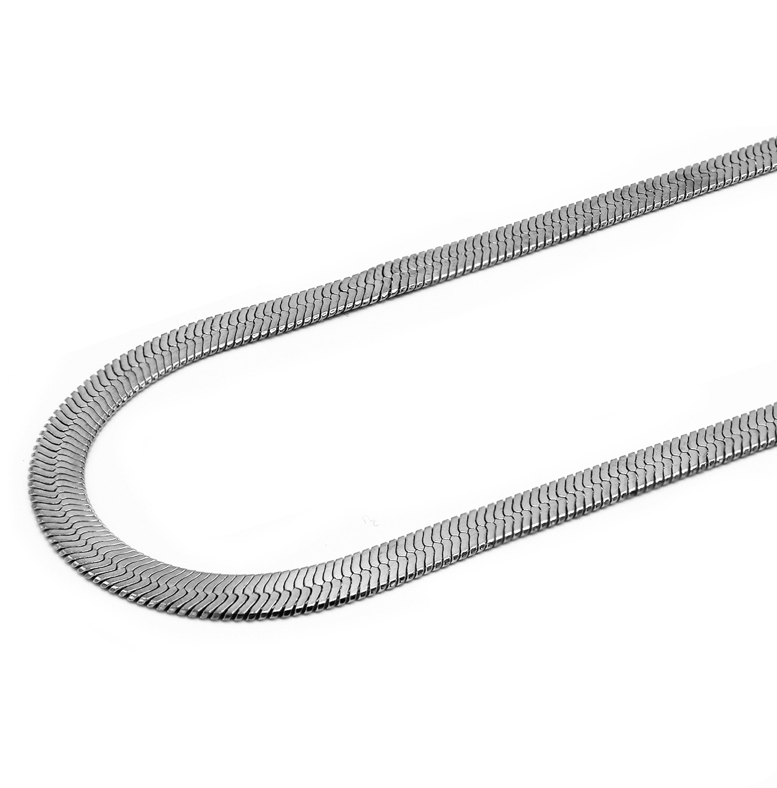 angled shot of the herring bone in silver laying on a white background
