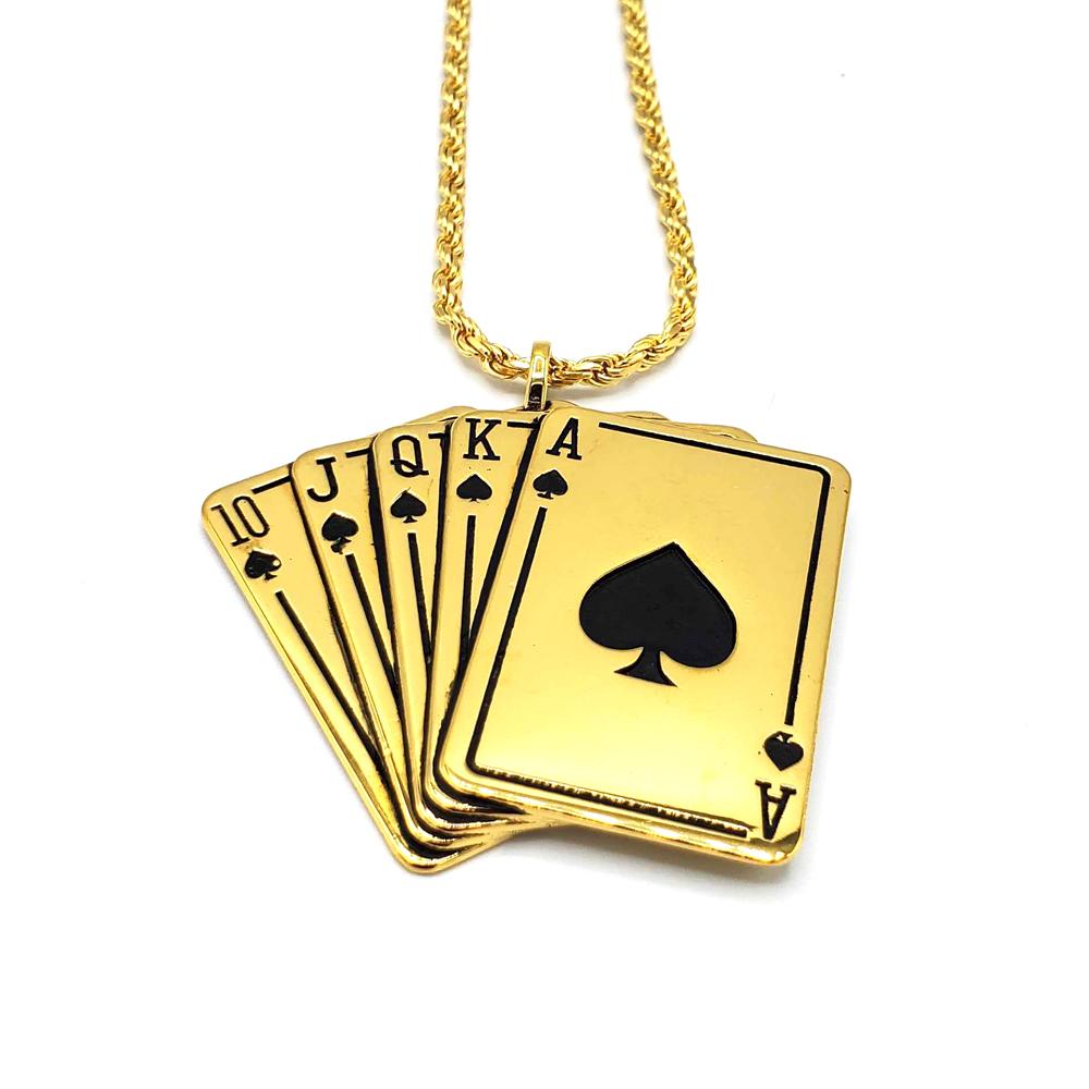 up close shot of the Royal Flush Pendant in gold on a white surface
