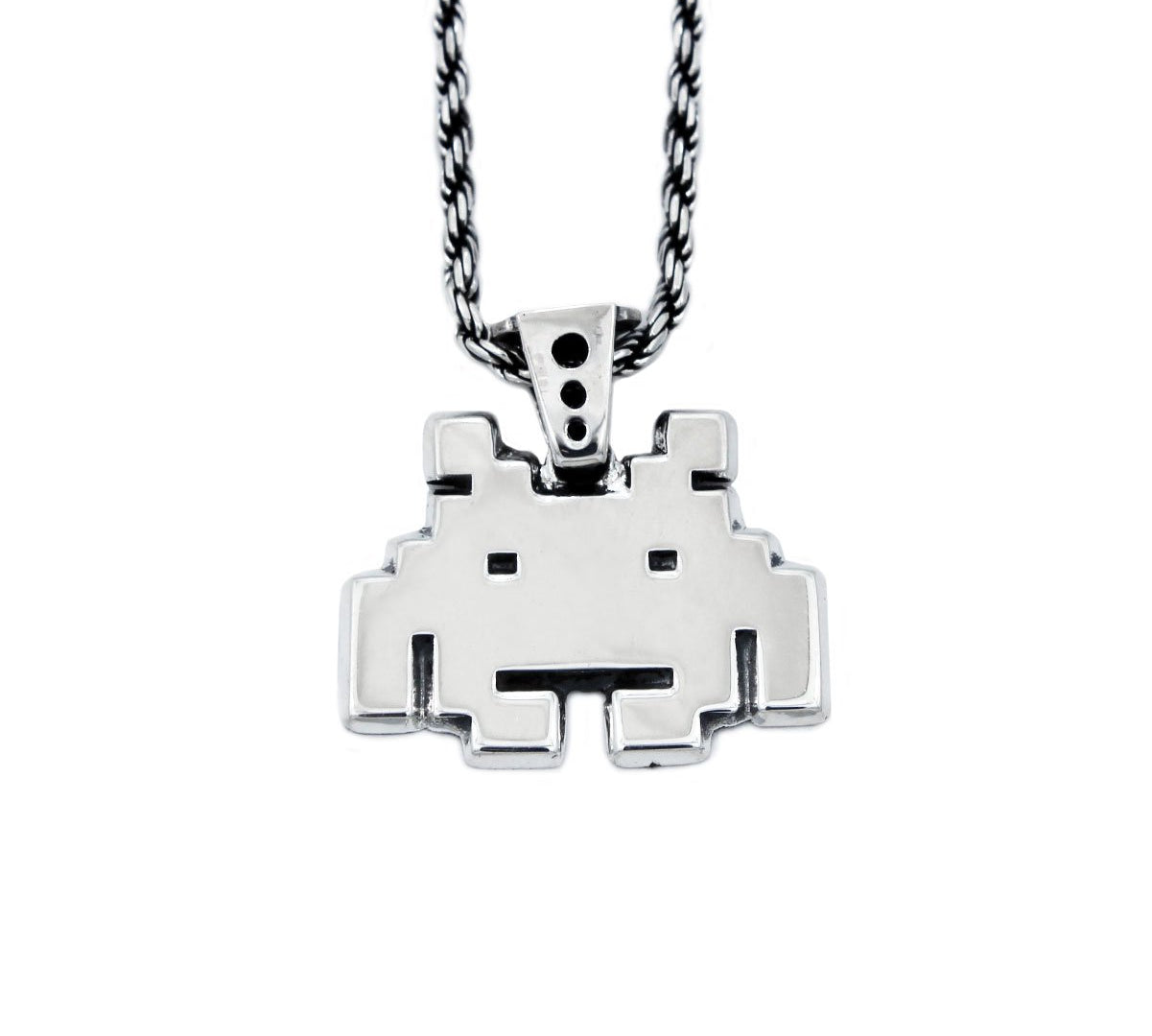front view of the smiley invader pendant in silver on a white background