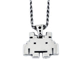 front view of the smiley invader pendant in silver on a white background
