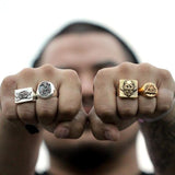 shot of a man wearing the All Seeing Eye Ring in gold from the han cholo precious metal collection