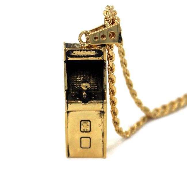 front angle view of the Arcade Machine Pendant in gold on a white background