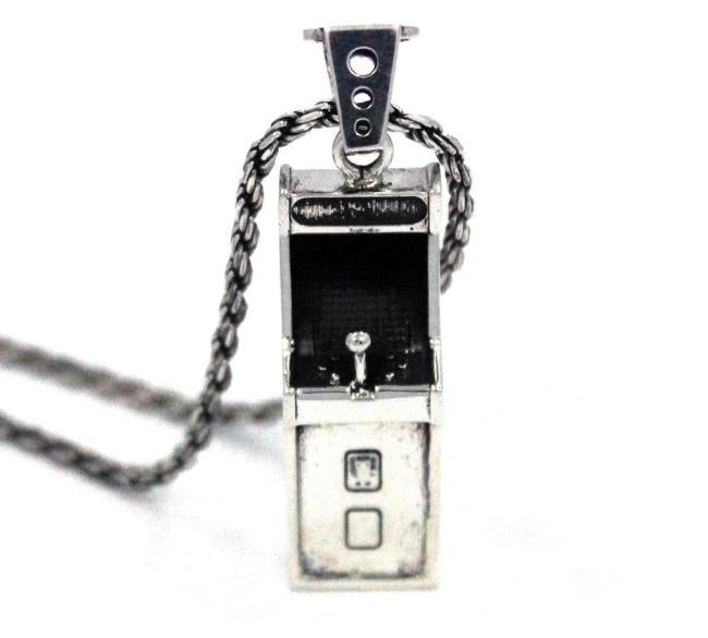 front angle view of the Arcade Machine Pendant in silver on a white background