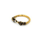 left side of the Arrow Ring in gold from the han cholo precious metal collection