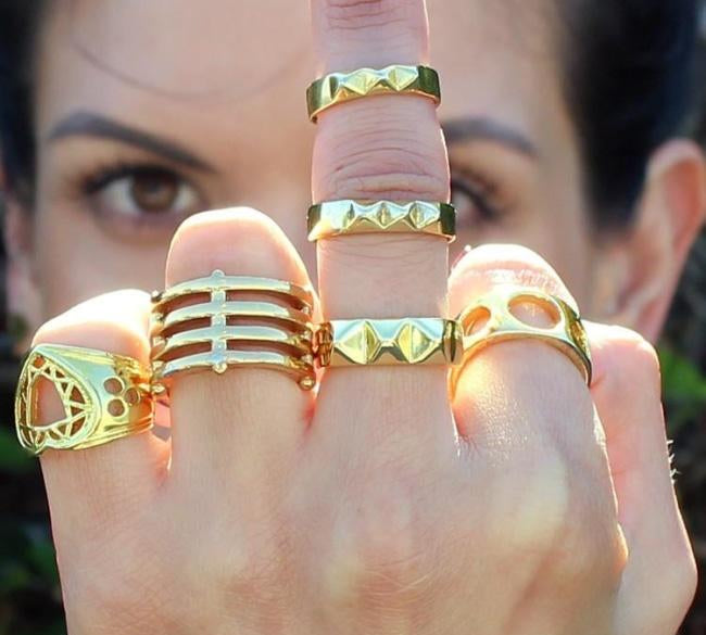 shot of a woman wearing the Baby Spike Ring in silver from the han cholo precious metal collection