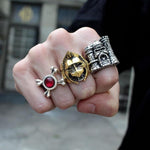 shot of a man wearing the castlegrayskull ring, skeletor armor ring and battlecat ring on his fist