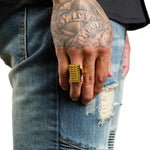 shot of a man wearing the Beater Ring in silver from the han cholo precious metal collection