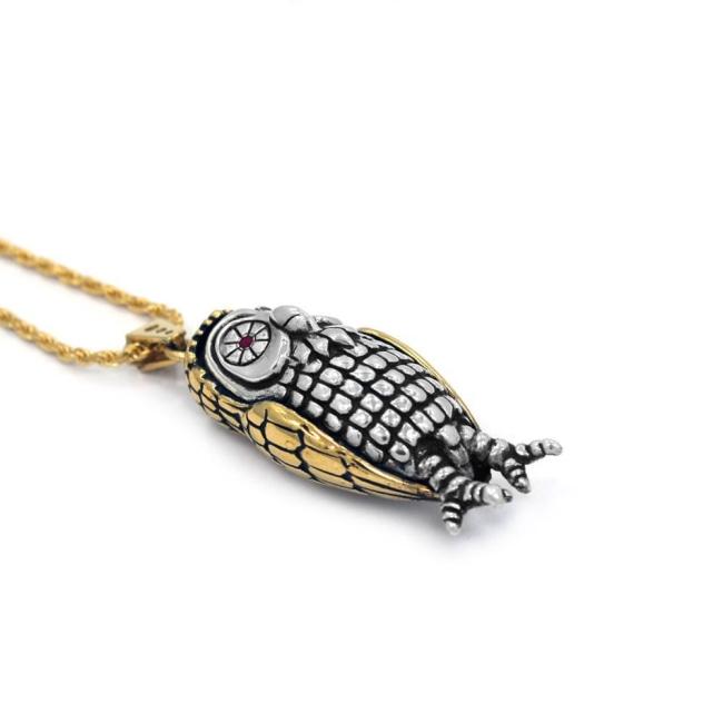 right side of the Big Bobo Owl Pendant in 2 silver and gold from the han cholo fantasy collection