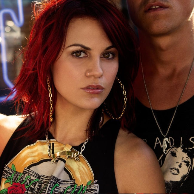 shot of the big chain hoops on a red haired woman