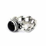 left side of the Black Hole Sun Ring in Silver from the han cholo precious metal collection