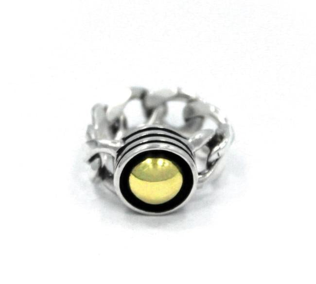front of the Black Hole Sun Ring in Silver with gold from the han cholo precious metal collection