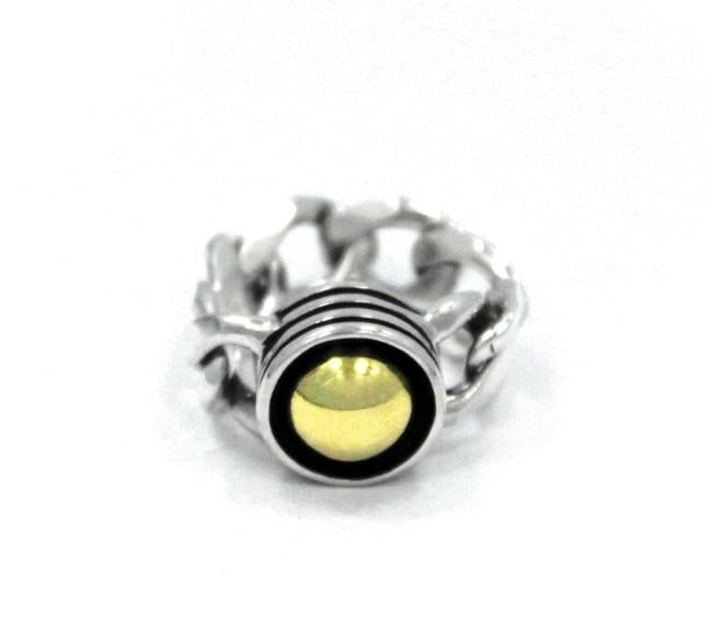 front of the Black Hole Sun Ring in Silver with gold from the han cholo precious metal collection