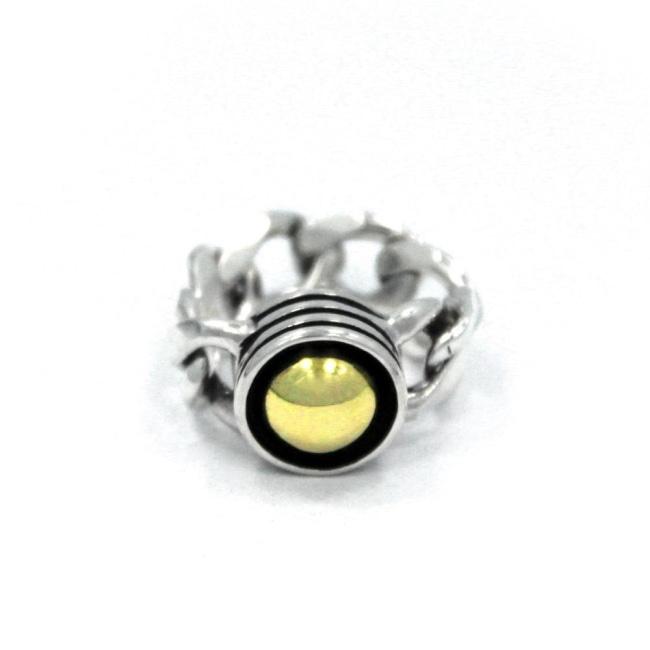 front of the Black Hole Sun Ring in Silver with gold from the han cholo precious metal collection