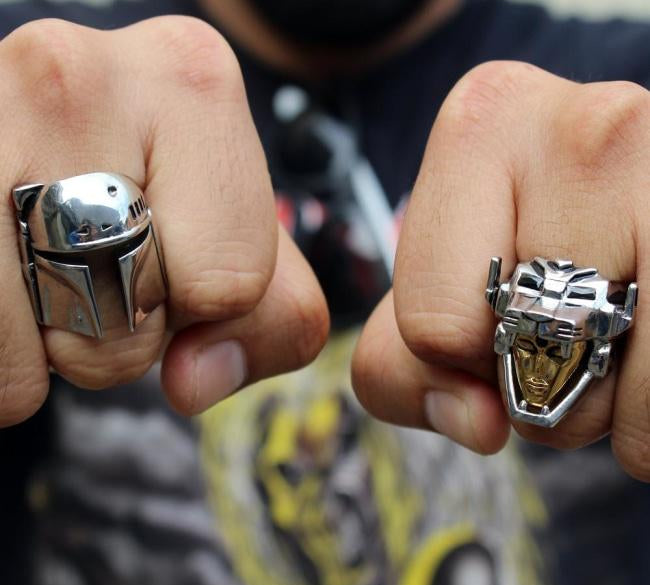 shot of a man wearing the voltron ring and boba fett ring