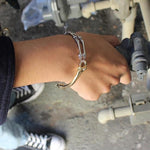 shot of a man wearing the Bone Bracelet from the han cholo skulls collection