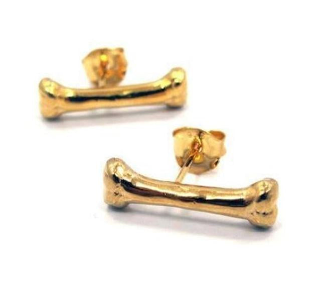 front of the Bone Earrings in gold from the han cholo shadow series collection